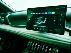 green dashboard with a screen display on the inside of a car
