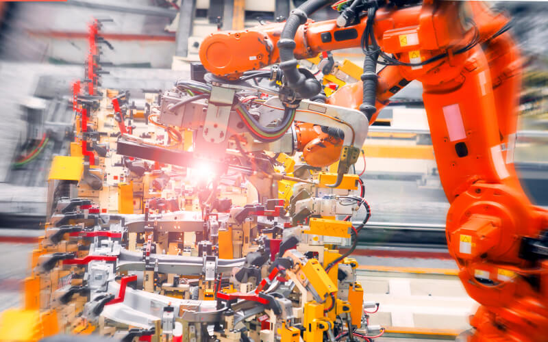 Robotic arm working in factory