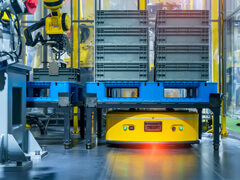 Picture of a Robot holding a Pallet in Warehouse
